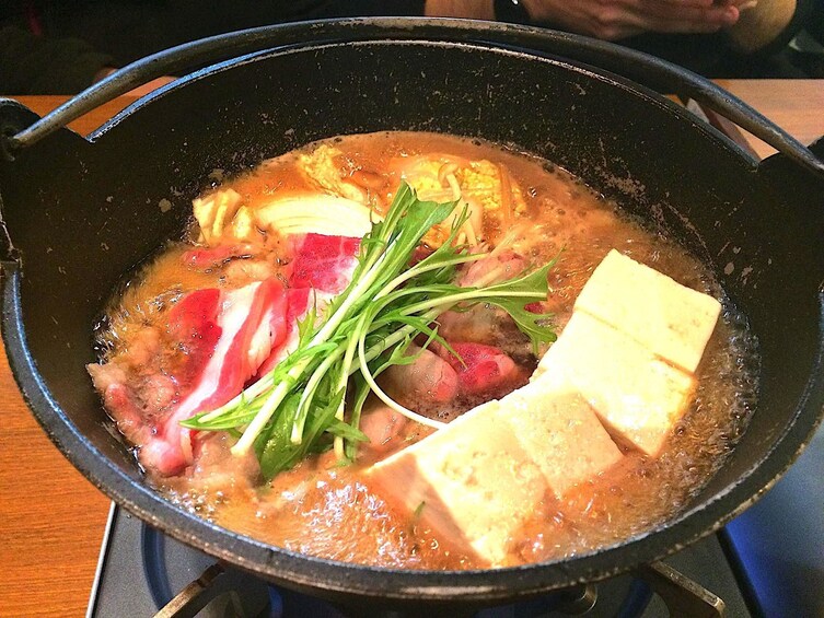 A bowl of tofu soup