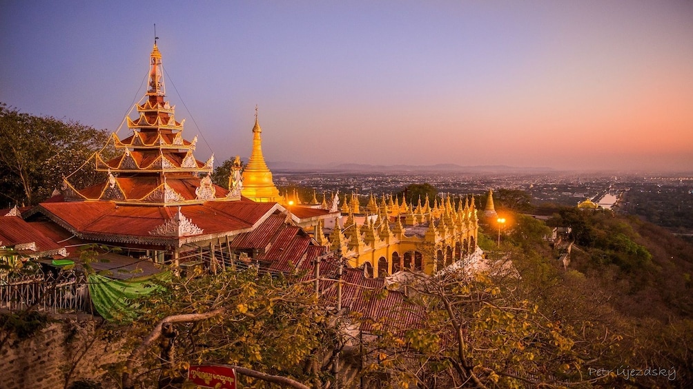 Gold pagodas at sunset in Myanmar
