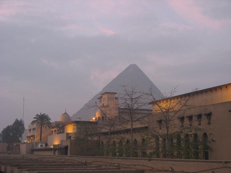 Show item 3 of 7. Pyramids in the distance in Egypt