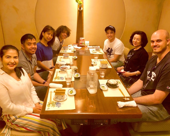 Table full of people in a Kyoto restaurant