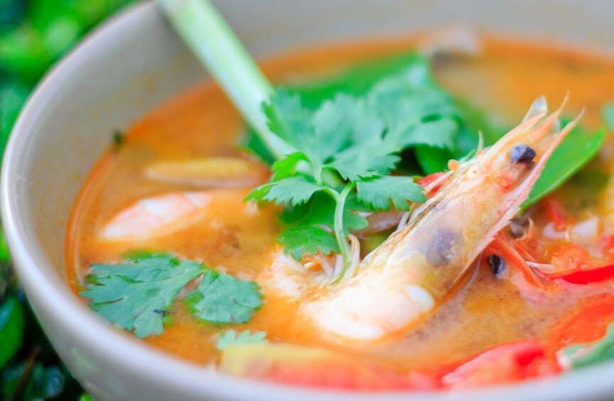 Closeup of colorful spicy prawn soup