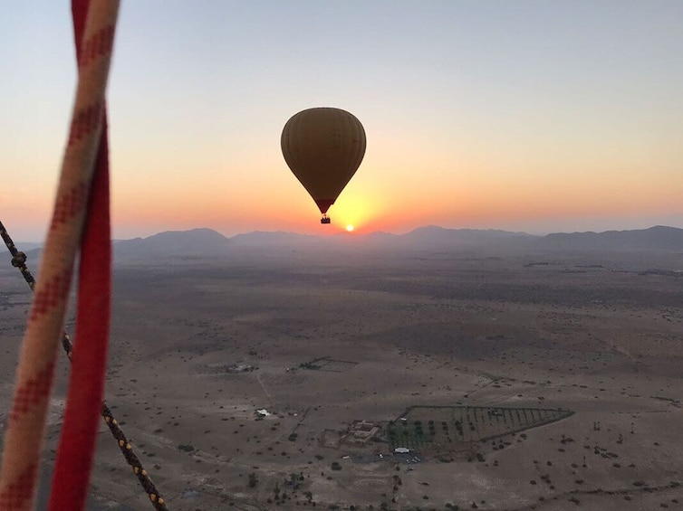 Hot air balloon during sunrise in Adagir, Morocco