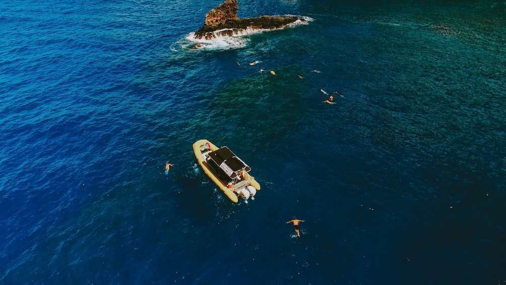 Aerial view of boat with snorkelers near Lanai, Hawaii