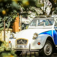 Experience the Secret of Paris in a vintage Car with a local