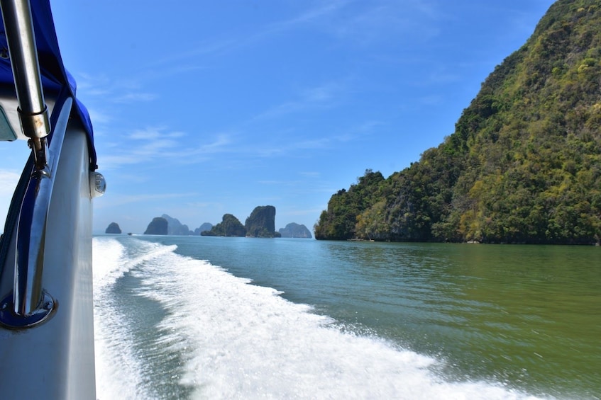 View from a boat on the water in Thailand