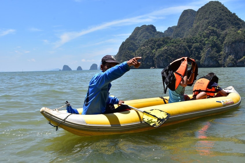 People on inflatable kayaks in Thailand