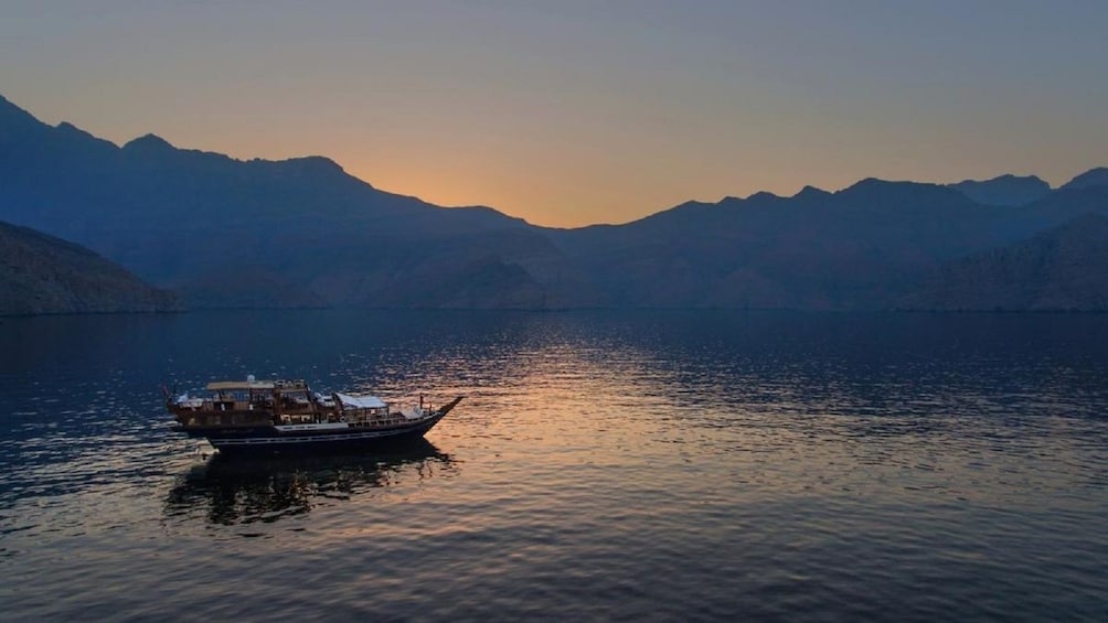 Dhow boat on a fjord in Khasab