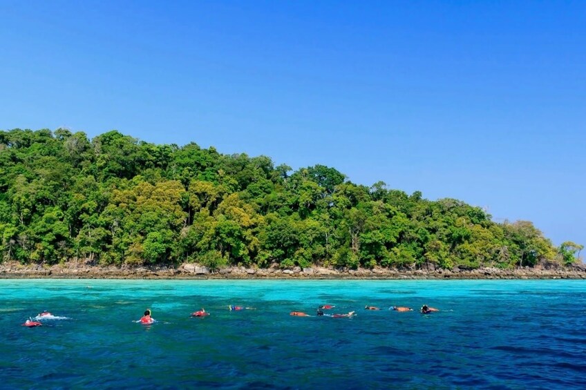 Snorkelers off the coast of the Surin Islands in Thailand