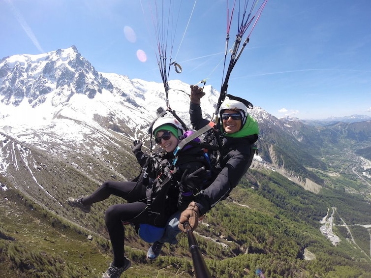 Show item 1 of 10. Couple pose on parachute at Chamonix