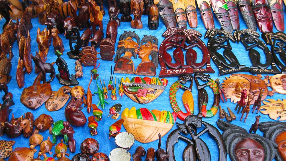 Wooden figurines and crafts at a market in Jamaica