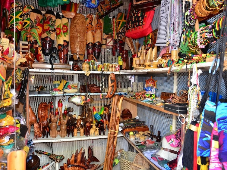 Wooden figurines and crafts at a market in Jamaica