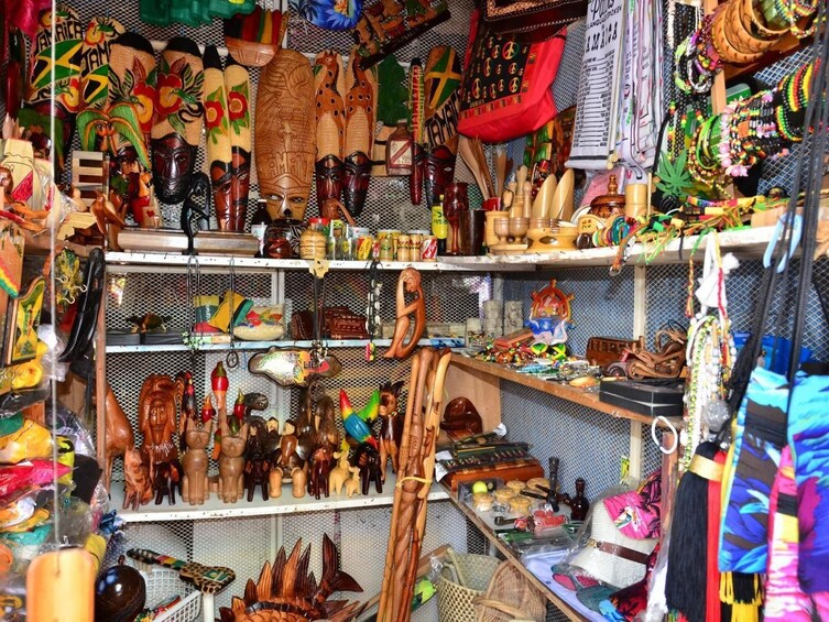 Wooden figurines and crafts at a market in Jamaica