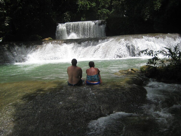 Couple enjoying YS Falls in Jamaica
