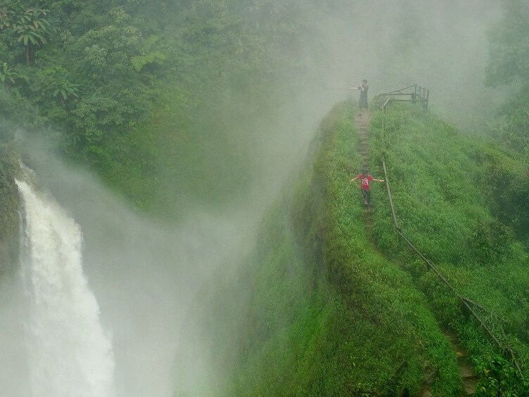 Misty view of Tad Yeaung Waterfall in Paksong, Laos