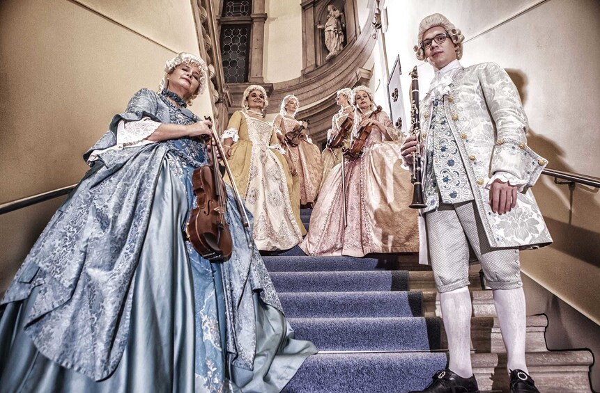 Old symphony of Vivaldi pose on a staircase in Venezia 