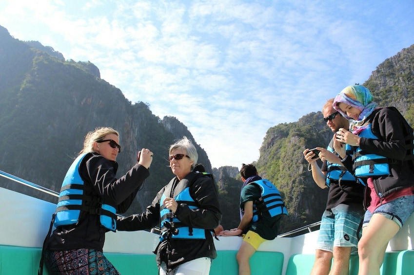 Group enjoying their time on a luxury speedboat on Phi Phi Island 