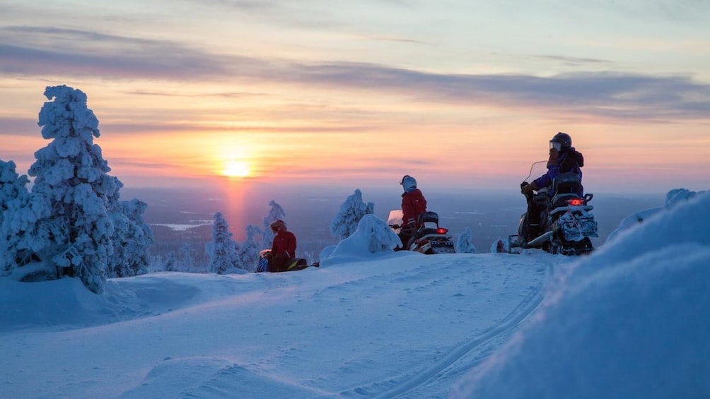 Group on snowmobiles in Rovaniemi

