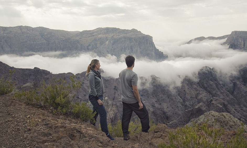 Hiking couple in the mountains of Oman