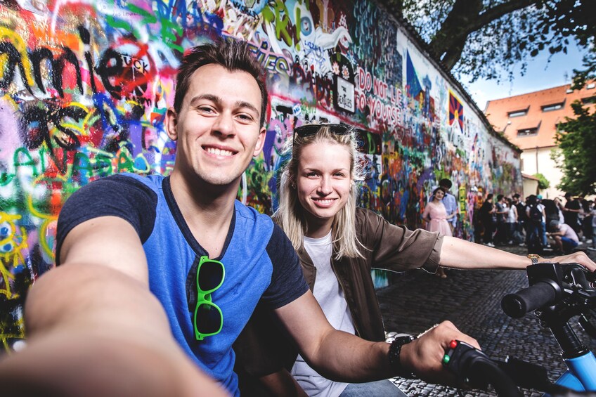 Couple enjoying an E-Scooter tour in Prague
