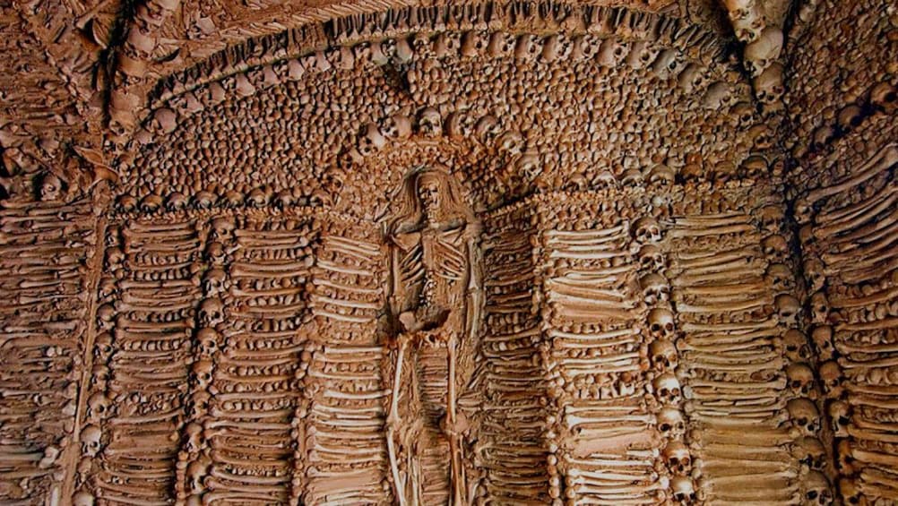 Wall adorned with bones at the Chapel of Bones in Evora