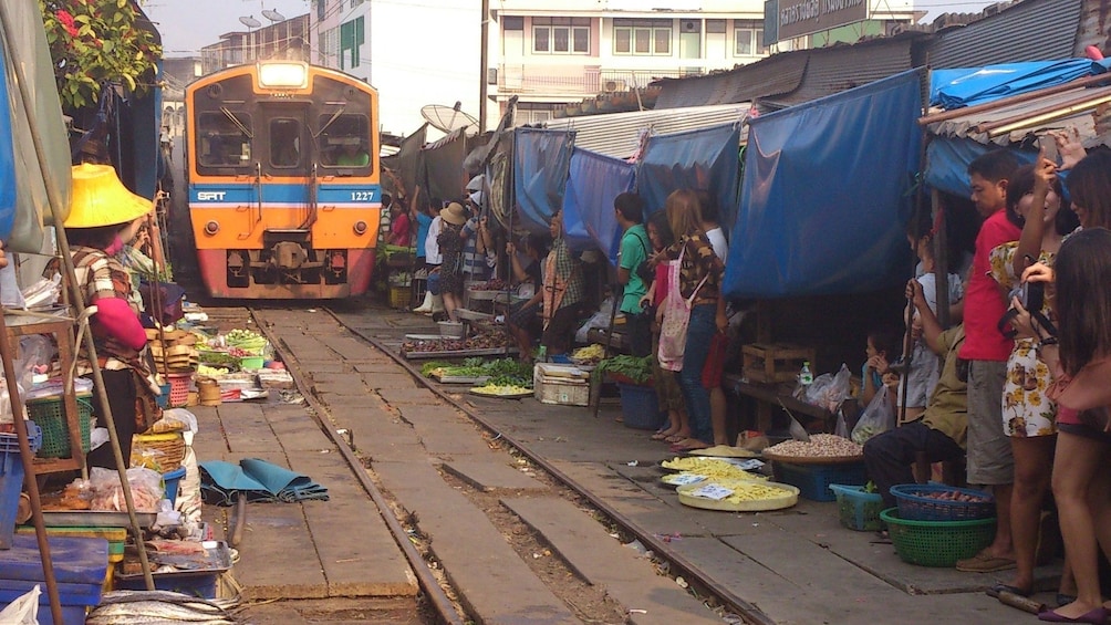 Show item 1 of 11. Maeklong Risky Market and Amphawa Weekend Market