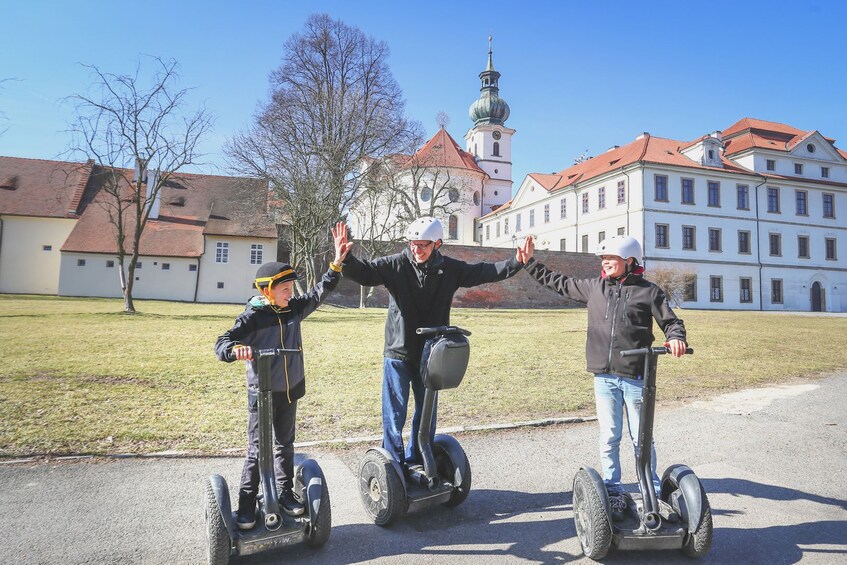 Family on segways in Prague