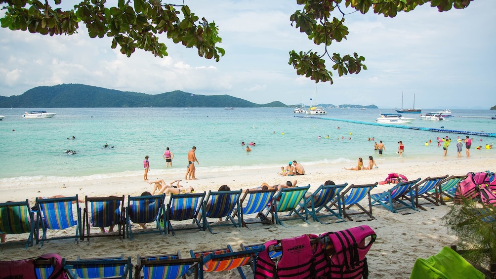 Guests sunbathing on Coral Island