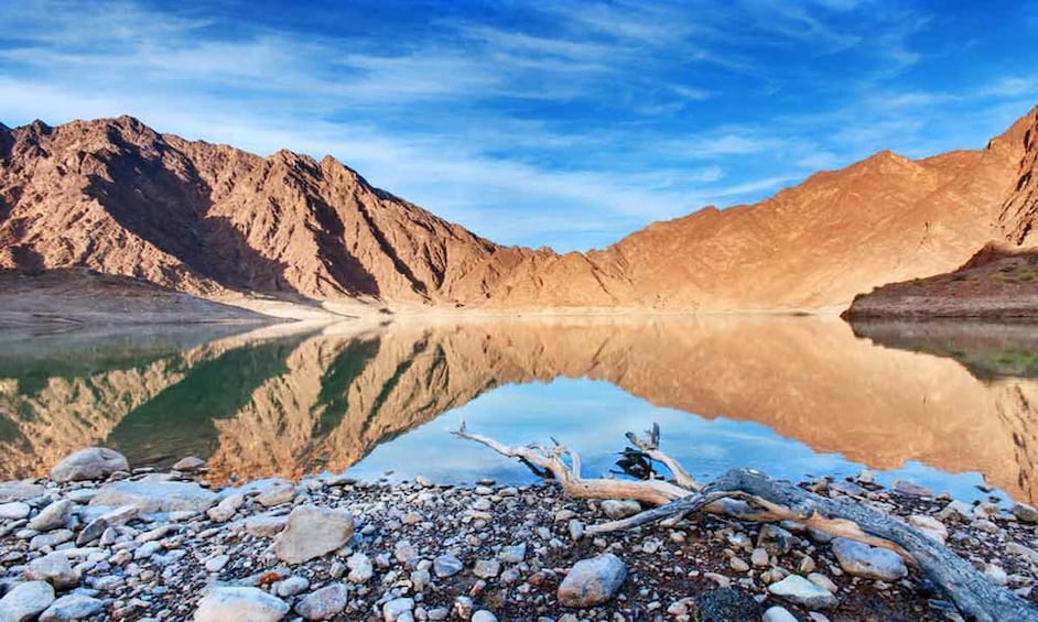 Show item 1 of 4. Hajar Mountains and lake in Dubai