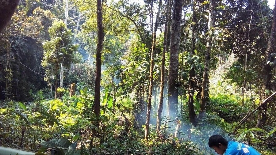 Man working at the Nam Ha National Bio-Diversity Conservation Area in Luang Namtha