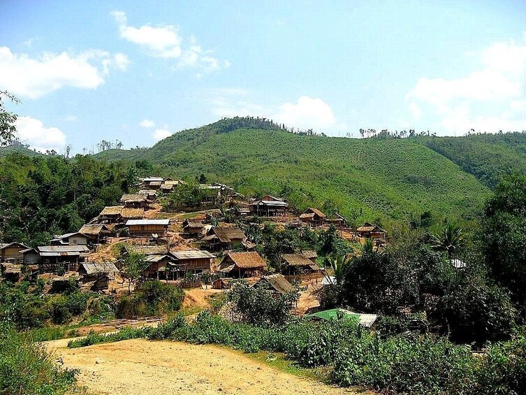 Homes and hills in Nam Ha National Protected Area