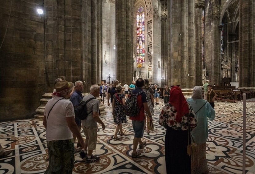 Visitors inside Duomo di Milano