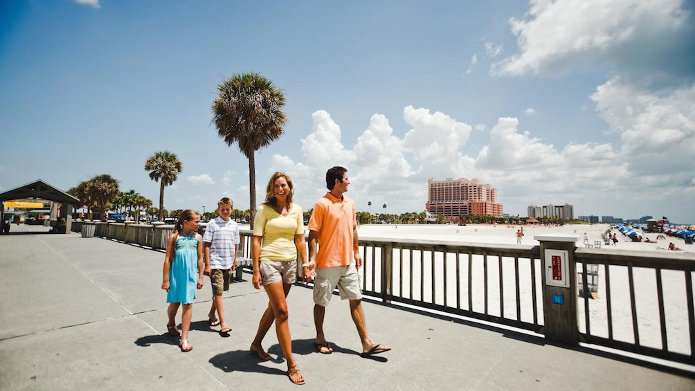 Family walks overlooking Clearwater Beach in Florida