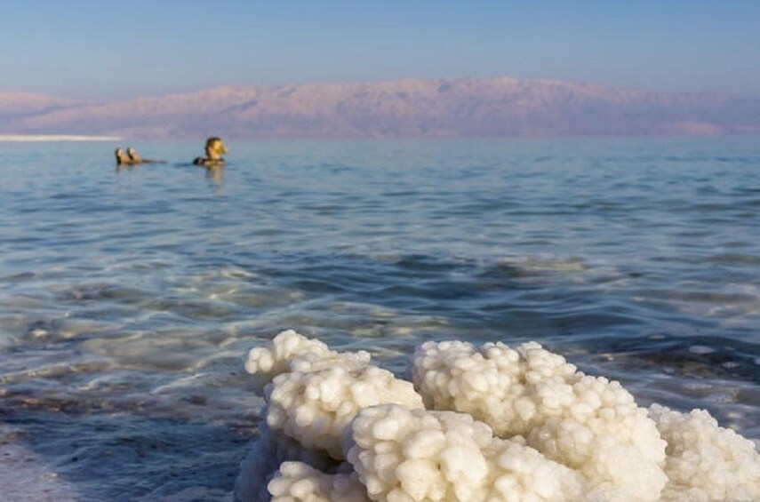 Woman floating about  the Dead Sea 