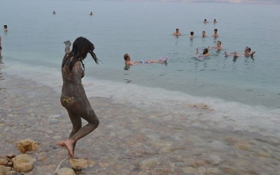 Group floating on the Dead Sea 