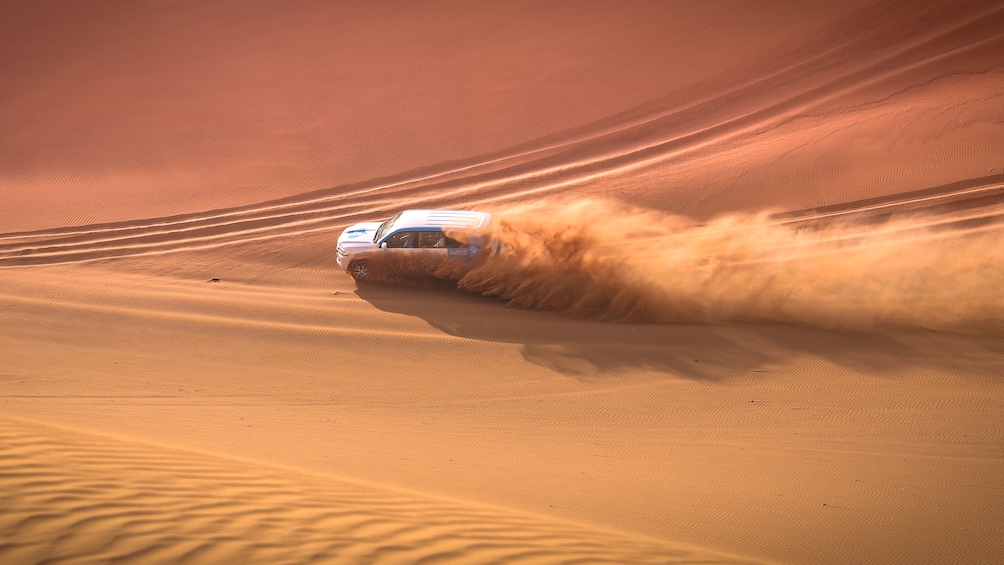 Jeep in the sand dunes in Doha