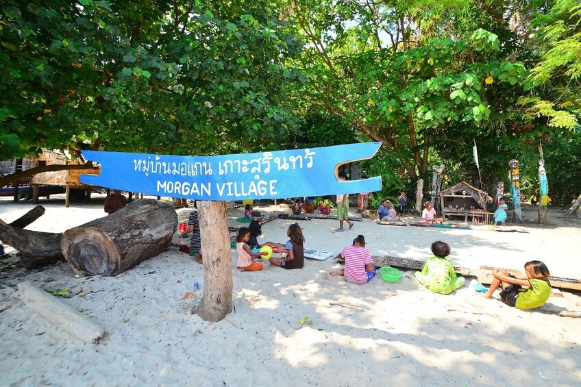 Kids of Moken Village playing on the beach