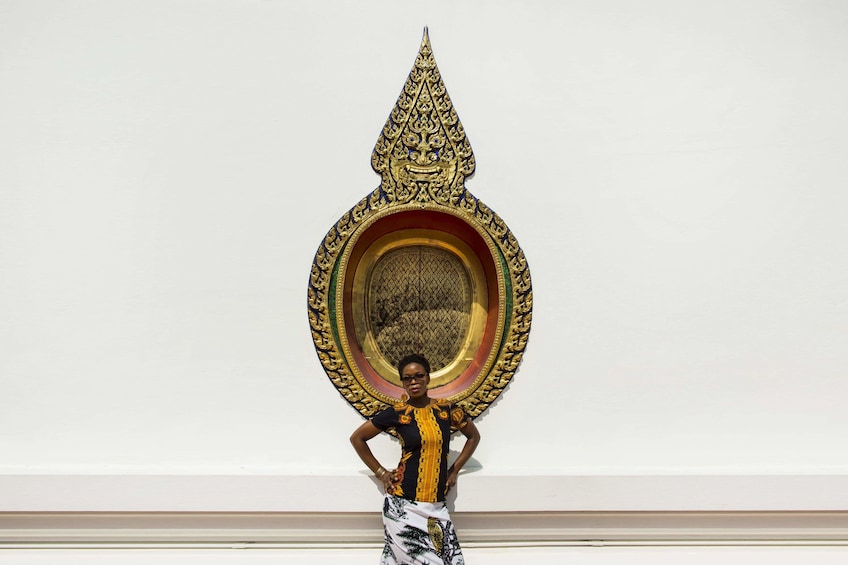 Show item 4 of 10. Woman posing for a photo on a tour in Bangkok