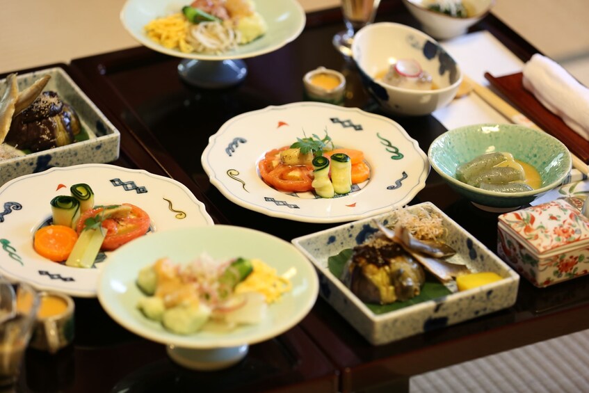 Show item 1 of 4. Closeup of small Japanese dishes in Osaka, Japan