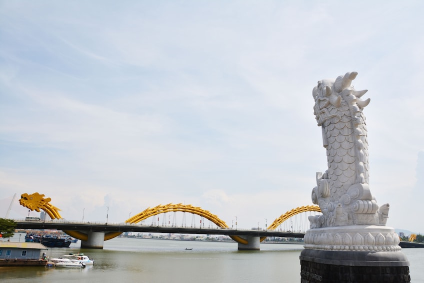 Motorbike food tour with driver in Ao Dai from Da Nang