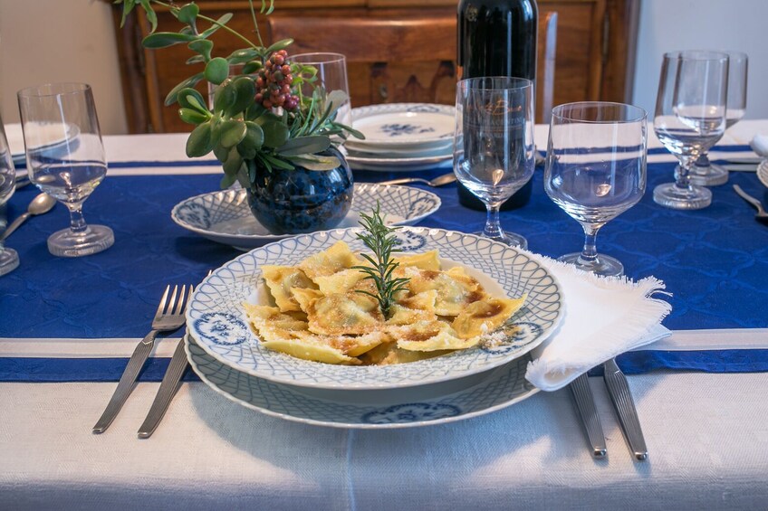 Local Market visit and Dining at a local's home in Aosta