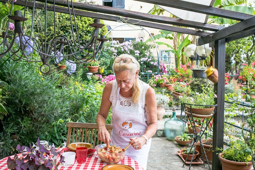 Woman preparing food in a garden in Turin