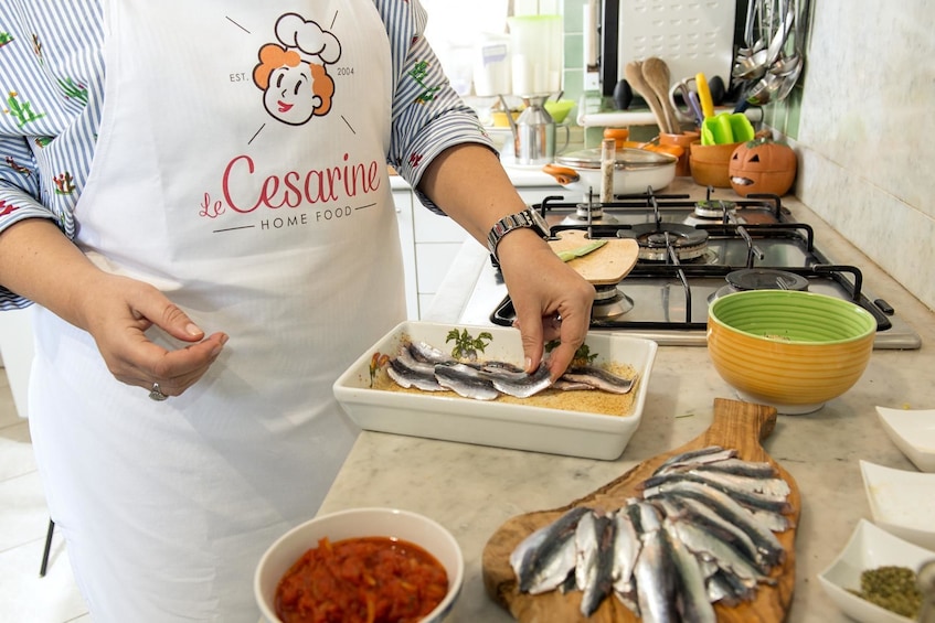 Person preparing food in Catania