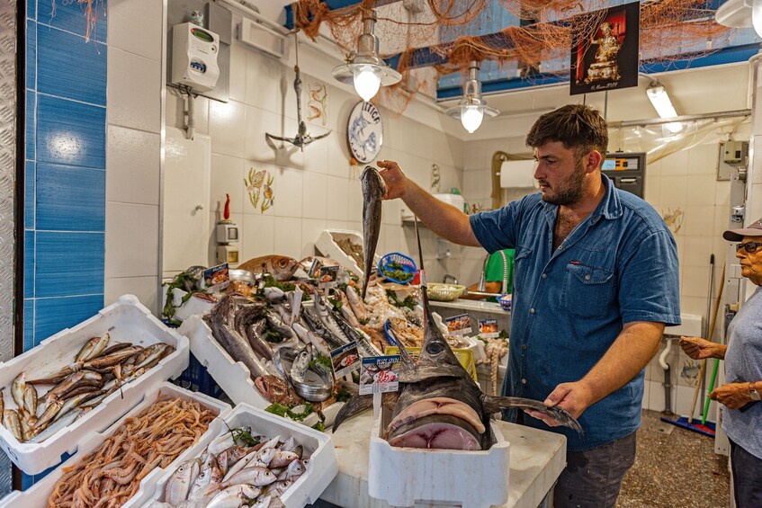 Local Market visit and Dining at a local's home in Genoa