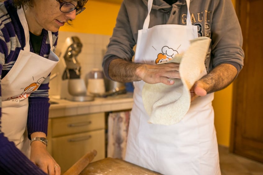Show item 4 of 6. Private cooking class at a local's home in Lake Maggiore