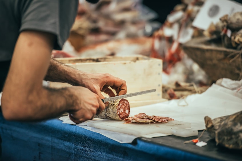 Local Market visit and Dining at a local's home in Lucca