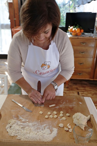 Private cooking class at a local's home in Naples