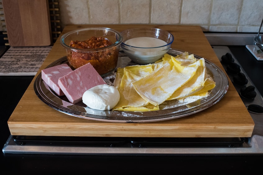 Private Market tour + Cook + Dine in a local home in Modena
