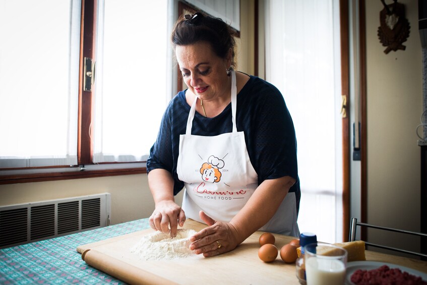 Private Market tour + Cook + Dine in a local home in Perugia