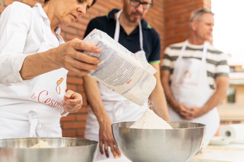 Private Market tour + Cook + Dine in a local home in Turin