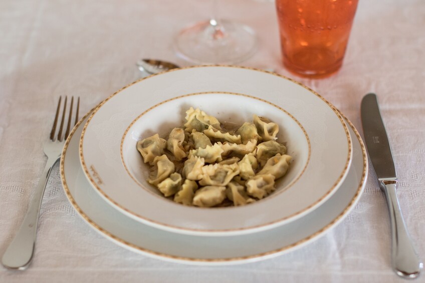 Local Market visit and Dining at a local's home in Turin